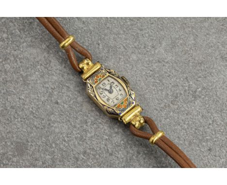 An Art Deco style 18ct gold and enamel ladies wrist watch, 1920s-30s, the 11.5mm. silvered octagonal dial with stylised Arabi
