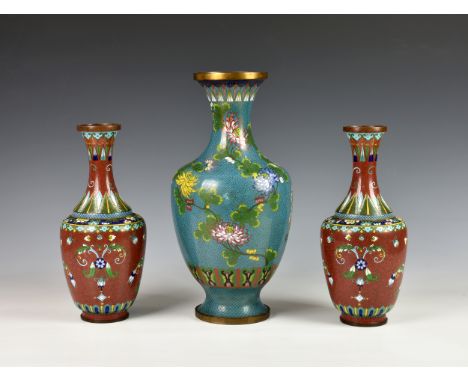 A pair of Chinese cloisonné vases, early 20th century, tapered baluster form with long tapering necks, geometric foliate and 