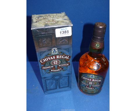 A 70 cl. bottle of Chivas Regal Scotch whisky, aged for 12 years in hand-crafted casks.