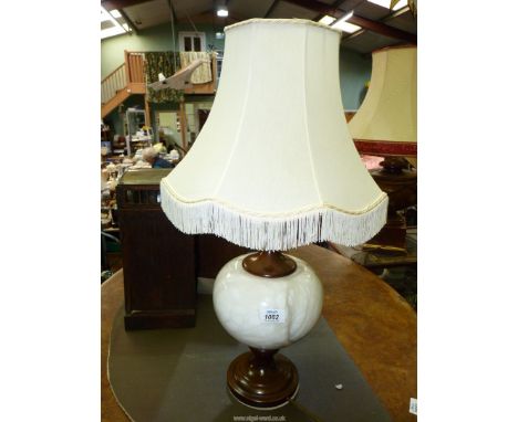 A Table lamp with bulbous alabaster centre and shade, 24" tall overall.