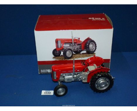 A Universal Hobbies 'Massey Ferguson MF65 MKII' tractor, exact 1:16 scale Die Cast model, boxed.