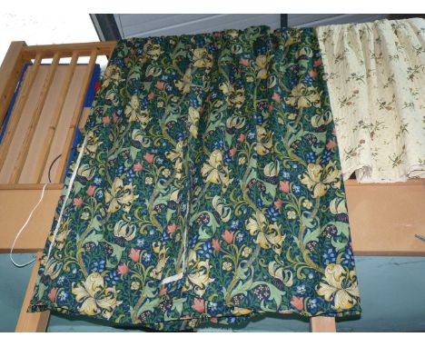 A pair of lined hand-made Curtains in Morris & Co. 'Golden Lily' fabric, 100" wide x 82" drop, with pair of tie-backs.