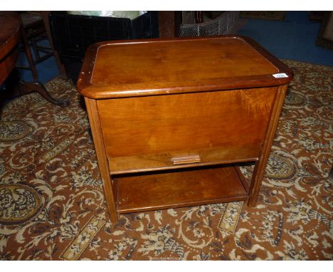 A Satinwood Workbox by C. Arnold Ltd., Marlow, Bucks, the lid lifting to reveal a green fabric lined interior and with a frie