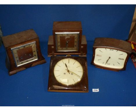 Four Geometric shaped cased clocks to include: Sydney Latimer, Edinburgh, Smith mantle clock, Junghans wall clock and another