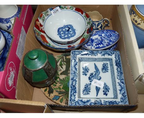 A collection of Eastern and blue and white ceramics including two Royal Worcester saucers and a Persian tile.