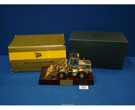 A JCB 4145 Farm Master wheeled loader, Specialist Collectors Edition gold plated, 1/32 scale model, boxed.