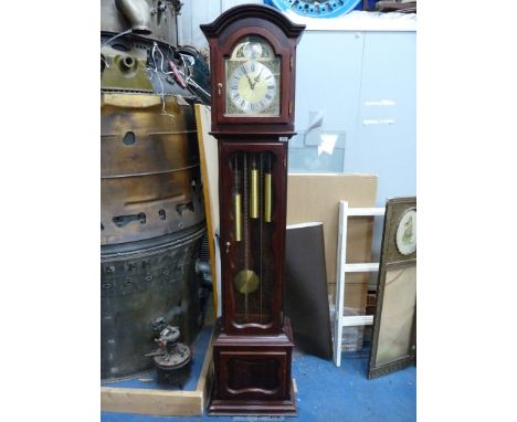 A contemporary Mahogany cased Long Case Clock having a silvered chapter ring with Roman numerals and Tempus Fugit globe to th