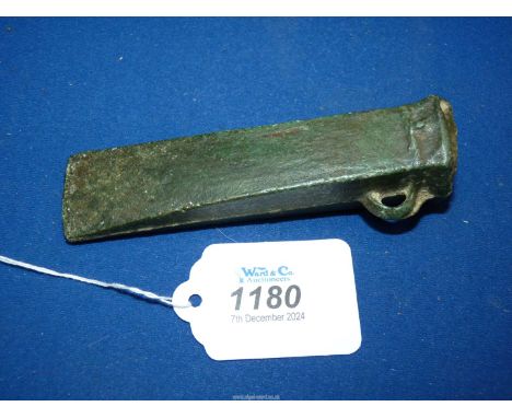 A collectable provenanced late bronze age axe head, copper alloy of square section form with single loop attachment, with the
