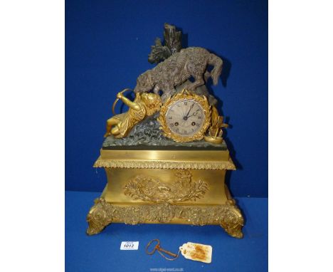 A charming and imposing Mantle Clock having a two train brass movement, the fine silvered face having Roman numerals with a B