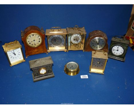 A small quantity of clocks to include: carriage, anniversary, miniature sestrel bulkhead clock, etc.