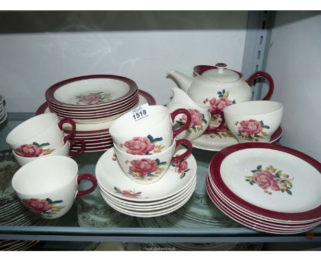 A Wedgwood 'Barlaston Rose' part breakfast set including five cups, six saucers, six tea plates, six bowls, six large plates,
