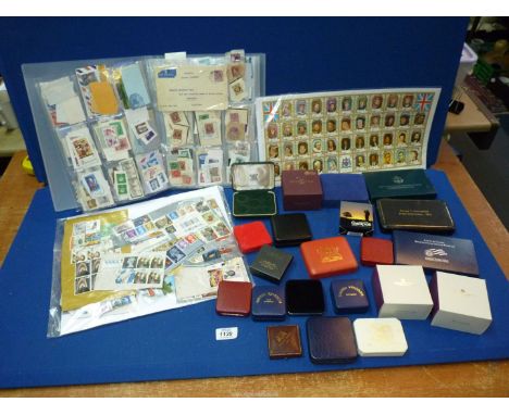A package of English and folder of world stamps, first day covers and complete set of 'Kings & Queens of England' stamps toge