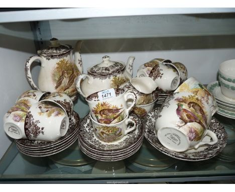 A Royal Worcester Palissy Game series tea set to include; 10 cups & saucers, 2 breakfast cups & saucers, 6 tea plates, coffee