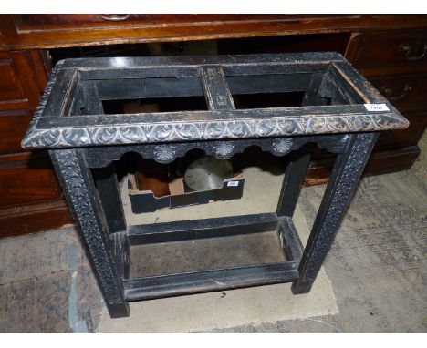 A carved Oak Umbrella/stick Stand, the drip tray being present, 24" x 10 1/2" x 23 7/8" high.