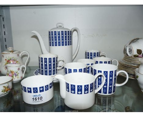 A Susie Cooper for Wedgwood 'Mercury' design coffee set including 6 cups and saucers, milk jug, sugar basin and coffee jug.