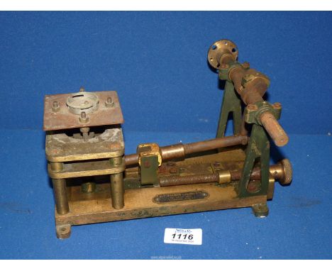 A heavy vintage, incomplete, brass/bronze and steel scientific instrument with rotary/rocking action, a scale from 0 to 15 ad