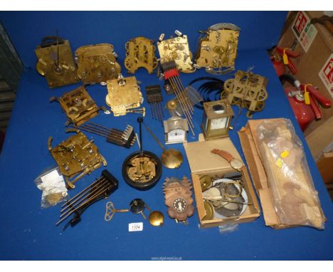 A large quantity of clock parts to include: carriage clock case, etc.