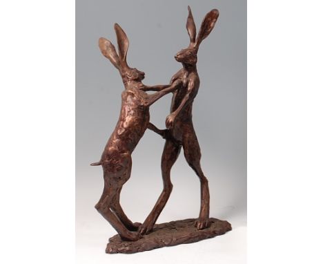 Paul Jenkins (b. 1949) - A cold cast resin model of two boxing hares, each in standing pose, naturalistically modelled, to in