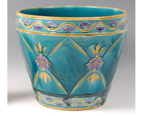 A large Minton Secessionist glazed pottery planter, of circular tapering form, underglaze painted in tones of blue, yellow an