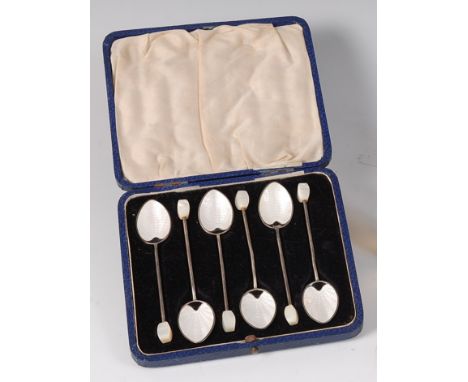 A cased set of six Art Deco silver and guilloche enamel teaspoons, each having mother of pearl mounted terminals, makers Robe