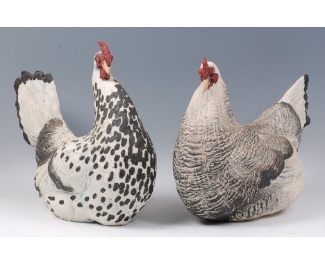 Contemporary School - A large painted stoneware model of a seated hen, with stamped monogram 'GJH' verso, h.40cm, length 43cm