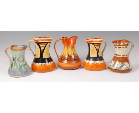 A pair of Myott & Son painted ceramic single handled jugs, each having pinched spouts and painted in tones of yellow, orange 