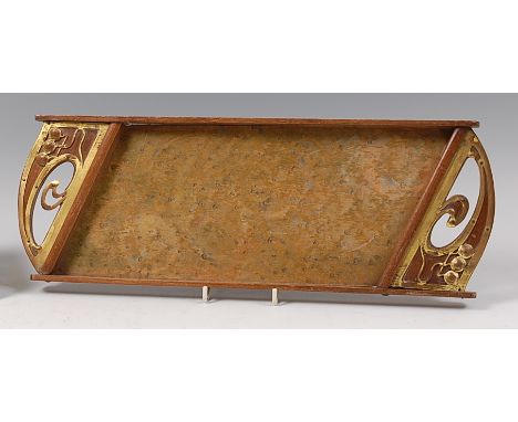 An Austrian Art Nouveau walnut and gilt brass mounted twin handled tray, the applied brasswork of sinuous floral stylised des