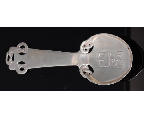 Archibald Knox (1864-1933) for Liberty & Co - A Cymric silver Coronation Spoon, the stem cast and pierced with Celtic knot mo