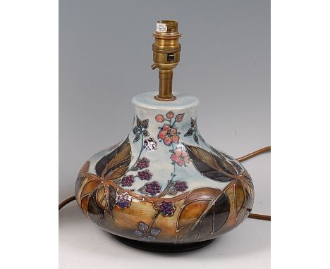 A Moorcroft Pottery table lamp, in the Bramble pattern, of lower bellied form, underglaze painted and tube-line decorated, im