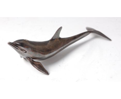 A contemporary Irish silver model of a stylised dolphin, with raised head, makers mark TS Ltd, Dublin 1991, weight 14.2oz, le