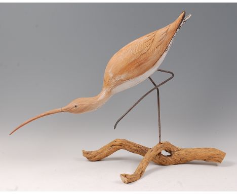 Geoffrey Bickley - A large partially white-washed pine model of a curlew, with steel legs, raised on naturalistic root-wood b