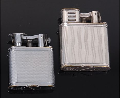 A 1930s Dunhill silver plated engine turned lighter, stamped 'Dunhill Made in England' and numbered '16162' verso, 5.8cm; tog
