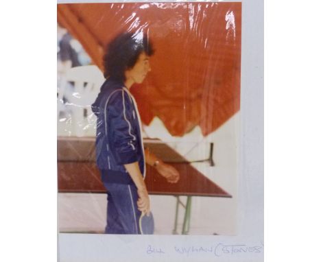 Rolling Stones interest. two 10 x 8"  photographs taken in the 1980's backstage showing Bill Wyman wearing a blue tracksuit a