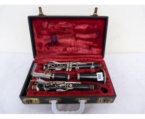 Clarinet by Besson of London, 4pc, serial number 200463, in hard case.