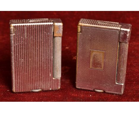 A pair of Parker The Roller Beacon lighters. H=5, W=3.5cm