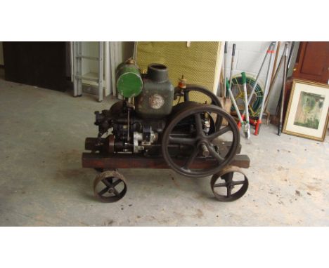 Vintage open crank stationary engine on trolley (makers mark indiscernible)