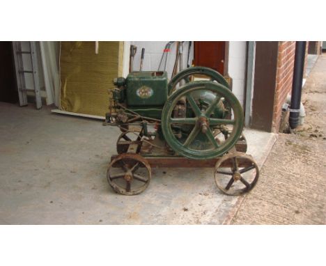 Vintage stationary engine by International Harvester  on trolley