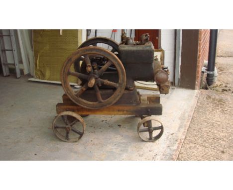 Vintage stationary engine by Fairbanks Morse on trolley