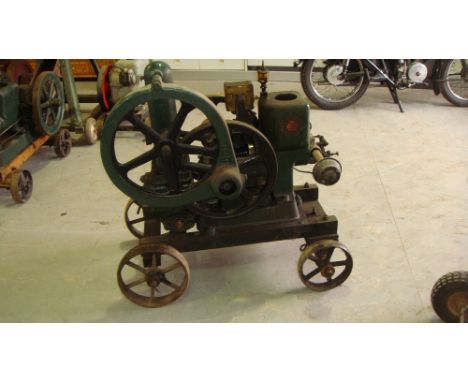 Vintage stationary engine by Ruston Hornsby on trolley