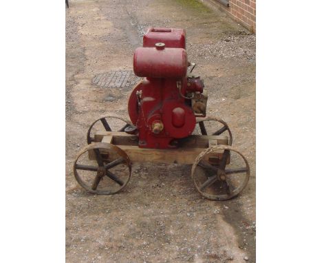 Vintage stationary engine by on trolley makers mark indiscernible
