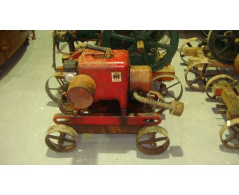 Vintage stationary engine by International Harvester on trolley