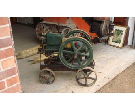 Vintage stationary engine by Wico on trolley