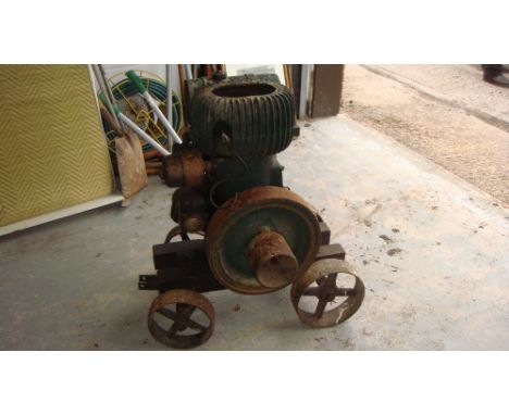 Vintage stationary engine by Wolseley on trolley