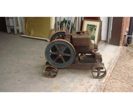 Vintage stationary engine by Fairbanks Morse on trolley