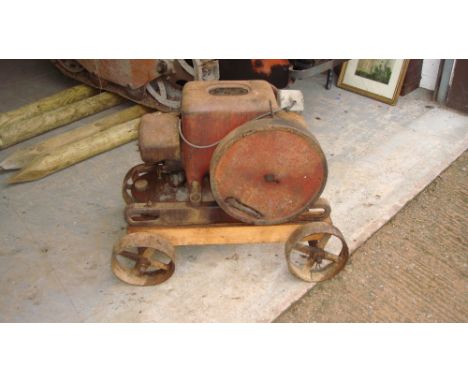 Vintage stationary engine by International Harvester on trolley