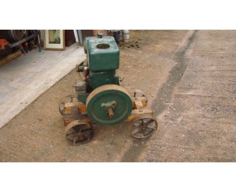 Vintage stationary engine by Ruston Hornsby on trolley