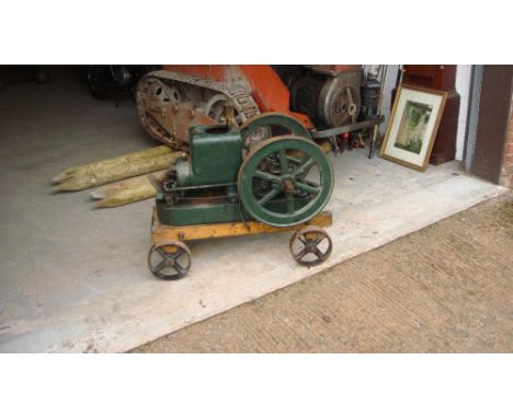 Vintage stationary engine by Fairbanks Morse on trolley