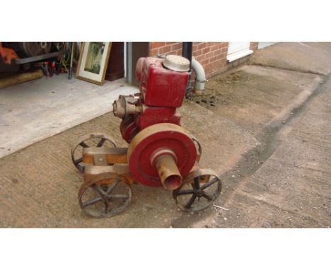 Vintage stationary engine by Ruston Hornsby on trolley