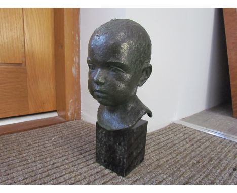 GEORGE EDGAR CAMPBELL (1899-1976): A bronze bust of a young boy signed and dated 1944 set on a black marble base 31cm high 