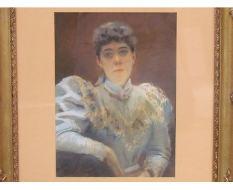 SHIRLEY FOX (XX): A pastel portrait depicting a young woman in a blue and lace dress, indistinctly signed lower left, 33x 24c